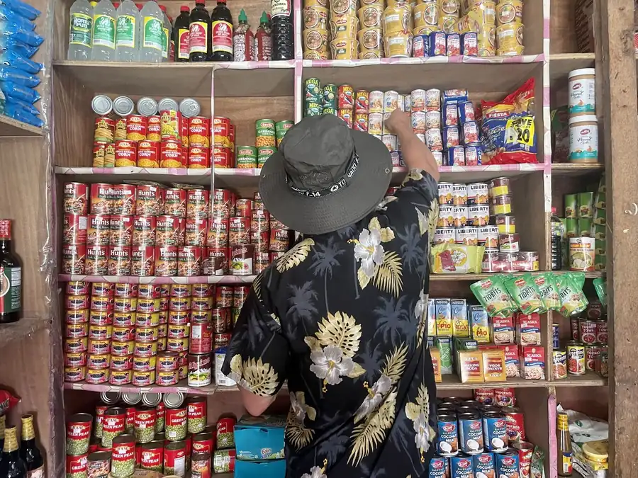 A stocked sari-sari store shelf